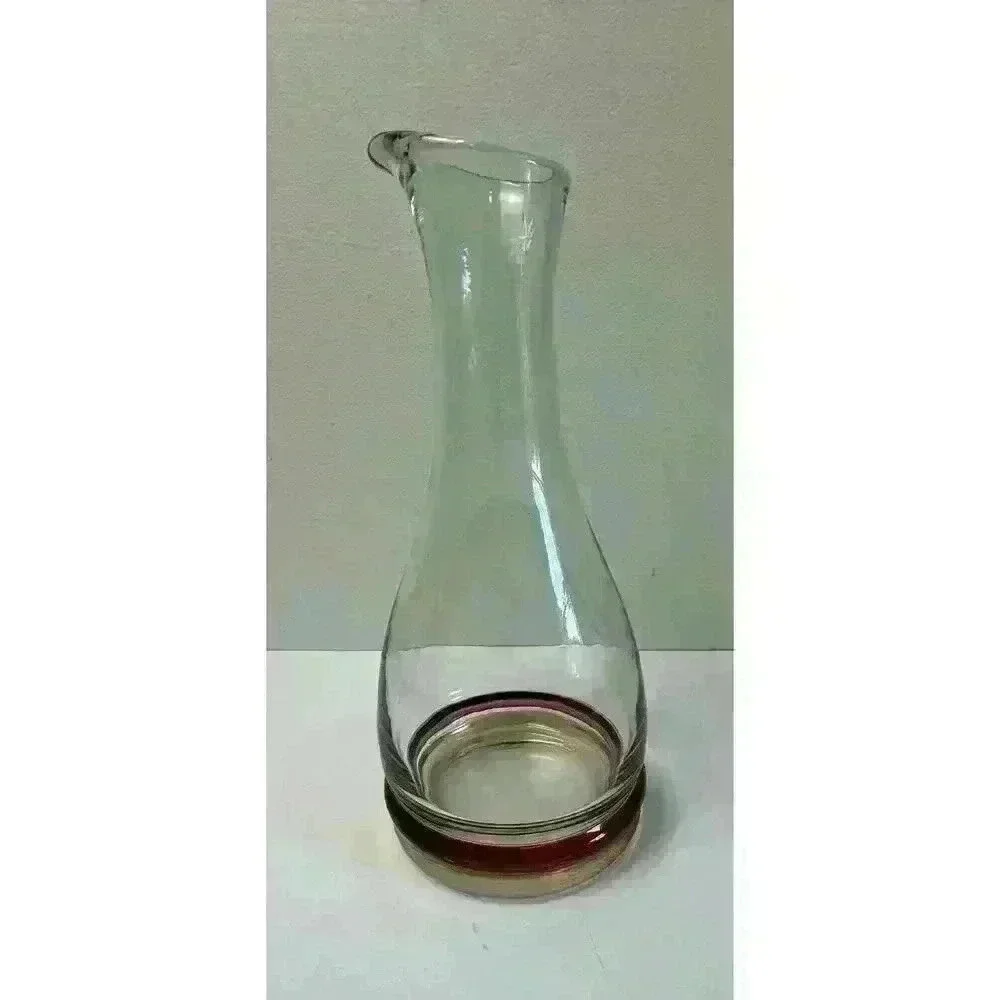 Vintage Glass decanter with cranberry and yellow colored bands on base Beautiful